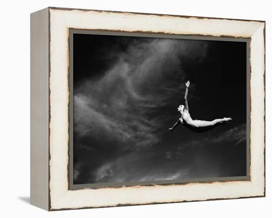 Woman Performing Swan Dive-Bettmann-Framed Premier Image Canvas