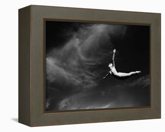 Woman Performing Swan Dive-Bettmann-Framed Premier Image Canvas