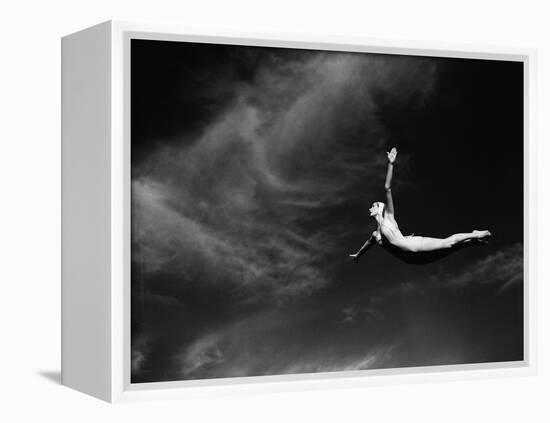 Woman Performing Swan Dive-Bettmann-Framed Premier Image Canvas