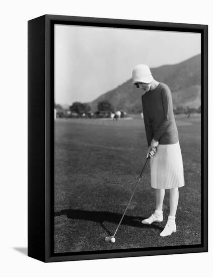 Woman Playing Golf-null-Framed Stretched Canvas