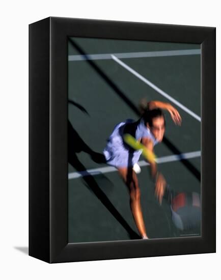 Woman Playing Tennis, Colorado, USA-Lee Kopfler-Framed Premier Image Canvas