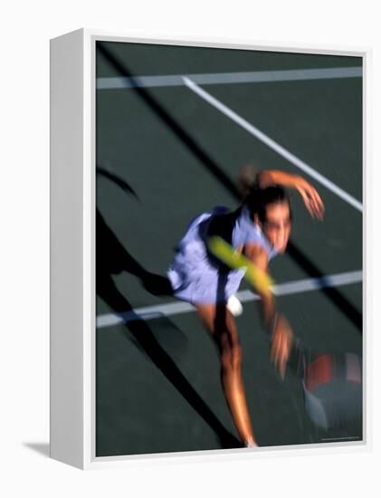 Woman Playing Tennis, Colorado, USA-Lee Kopfler-Framed Premier Image Canvas