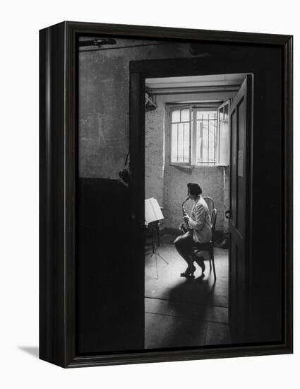 Woman Playing the Saxophone-Loomis Dean-Framed Premier Image Canvas