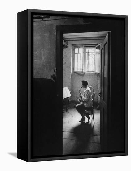 Woman Playing the Saxophone-Loomis Dean-Framed Premier Image Canvas