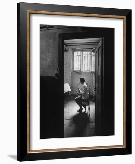 Woman Playing the Saxophone-Loomis Dean-Framed Photographic Print