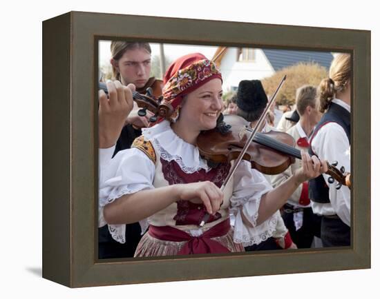 Woman Playing Violin and Wearing Folk Dress, Borsice, Brnensko, Czech Republic-Richard Nebesky-Framed Premier Image Canvas