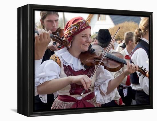 Woman Playing Violin and Wearing Folk Dress, Borsice, Brnensko, Czech Republic-Richard Nebesky-Framed Premier Image Canvas