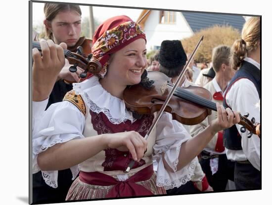 Woman Playing Violin and Wearing Folk Dress, Borsice, Brnensko, Czech Republic-Richard Nebesky-Mounted Photographic Print