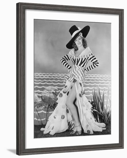 Woman Posing in Striped and Polkadot Costume-null-Framed Photo