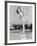 Woman Posing on Top of a Pillar Next to a Swimming Pool-null-Framed Photo