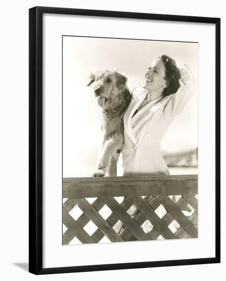 Woman Posing with Her Airedale at the Beach-null-Framed Photo