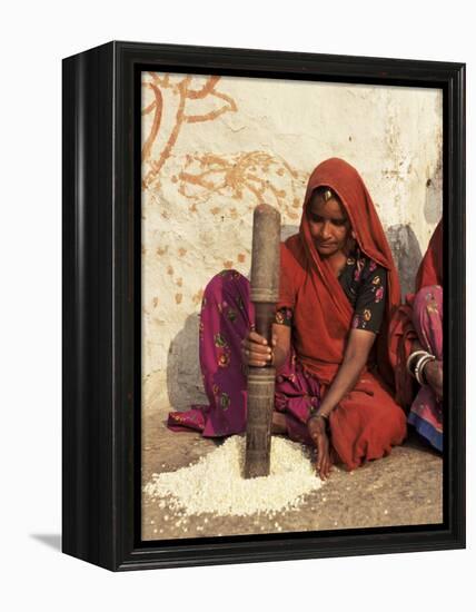 Woman Pounding Food in Village Near Deogarh, Rajasthan State, India-Robert Harding-Framed Premier Image Canvas