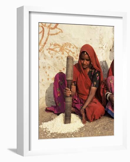 Woman Pounding Food in Village Near Deogarh, Rajasthan State, India-Robert Harding-Framed Photographic Print