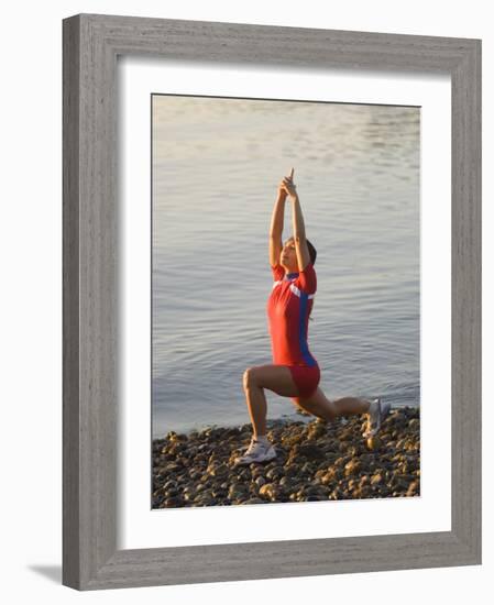 Woman Practicing Yoga on the Riverside, Bainbridge Island, Washington State, USA-null-Framed Photographic Print