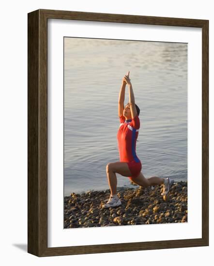 Woman Practicing Yoga on the Riverside, Bainbridge Island, Washington State, USA-null-Framed Photographic Print