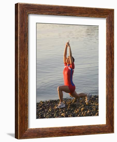Woman Practicing Yoga on the Riverside, Bainbridge Island, Washington State, USA-null-Framed Photographic Print