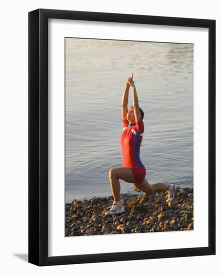 Woman Practicing Yoga on the Riverside, Bainbridge Island, Washington State, USA-null-Framed Photographic Print