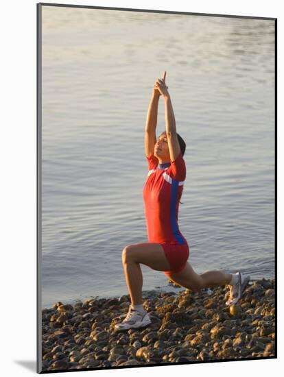 Woman Practicing Yoga on the Riverside, Bainbridge Island, Washington State, USA-null-Mounted Photographic Print