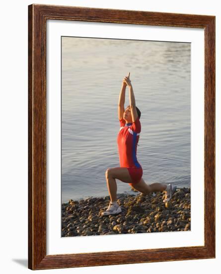 Woman Practicing Yoga on the Riverside, Bainbridge Island, Washington State, USA-null-Framed Photographic Print