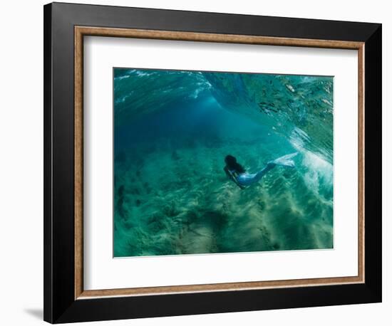 Woman Pretending to Be a Mermaid Swimming Underwater, Hawaii, USA-null-Framed Photographic Print