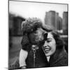 Woman Profiling a Big Smile While Adoring Her Poodle Wearing Large Swiss Watch on Dog Collar-Yale Joel-Mounted Photographic Print