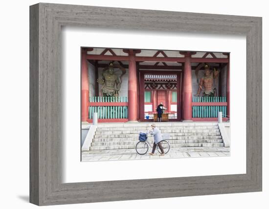 Woman Pushing Bicycle Past Shitenno-Ji Temple, Tennoji, Osaka, Kansai, Japan-Ian Trower-Framed Photographic Print