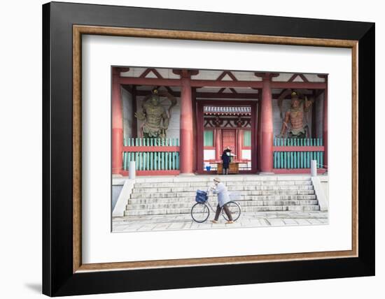 Woman Pushing Bicycle Past Shitenno-Ji Temple, Tennoji, Osaka, Kansai, Japan-Ian Trower-Framed Photographic Print