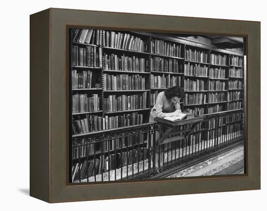 Woman Reading Book Among Shelves on Balcony in American History Room in New York Public Library-Alfred Eisenstaedt-Framed Premier Image Canvas