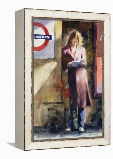 Woman Reading on Notting Hill Gate Platform-John Lidzey-Framed Premier Image Canvas