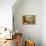 Woman Reading Plans in Living Room, Retro-null-Framed Stretched Canvas displayed on a wall