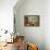 Woman Reading Plans in Living Room, Retro-null-Framed Stretched Canvas displayed on a wall