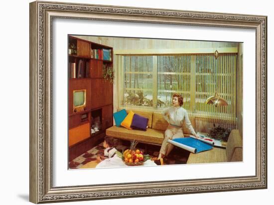 Woman Reading Plans in Living Room, Retro-null-Framed Art Print