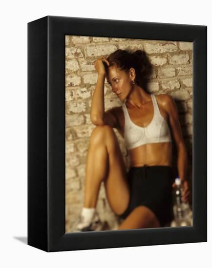 Woman Resting after Working Out, New York, New York, USA-Chris Trotman-Framed Premier Image Canvas