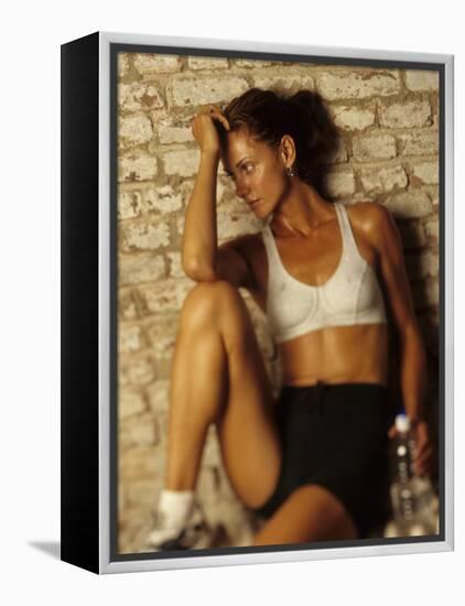 Woman Resting after Working Out, New York, New York, USA-Chris Trotman-Framed Premier Image Canvas