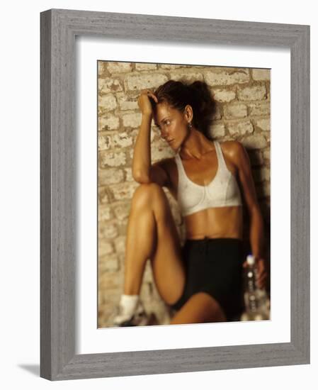 Woman Resting after Working Out, New York, New York, USA-Chris Trotman-Framed Photographic Print