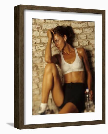 Woman Resting after Working Out, New York, New York, USA-Chris Trotman-Framed Photographic Print