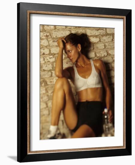 Woman Resting after Working Out, New York, New York, USA-Chris Trotman-Framed Photographic Print