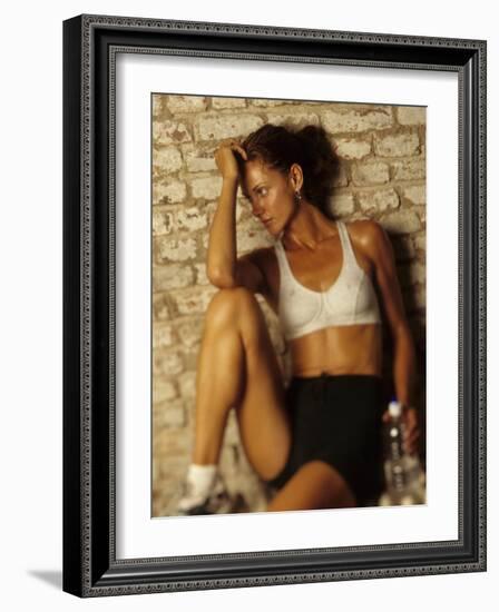 Woman Resting after Working Out, New York, New York, USA-Chris Trotman-Framed Photographic Print