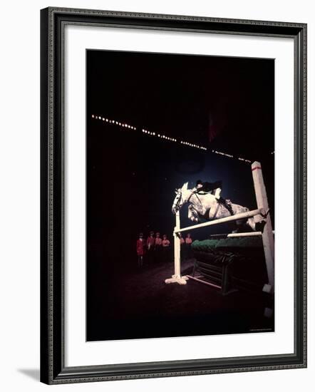 Woman Rider Taking Horse over Jump during National Horse Show-Gjon Mili-Framed Photographic Print
