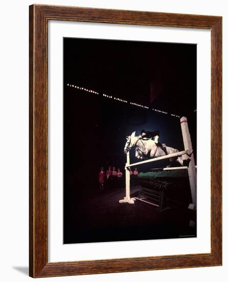 Woman Rider Taking Horse over Jump during National Horse Show-Gjon Mili-Framed Photographic Print