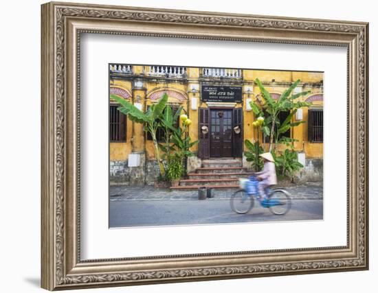 Woman Riding Bicycle Past Restaurant, Hoi an (Unesco World Heritage Site), Quang Ham, Vietnam-Ian Trower-Framed Photographic Print