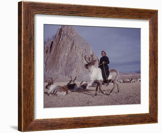 Woman Riding One of Her Reindeer in Outer Mongolia-Howard Sochurek-Framed Photographic Print