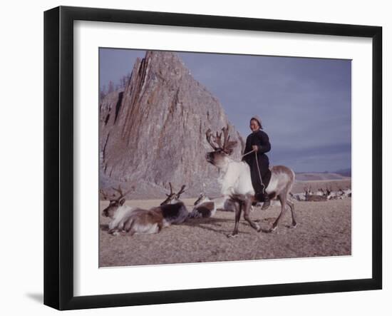 Woman Riding One of Her Reindeer in Outer Mongolia-Howard Sochurek-Framed Photographic Print