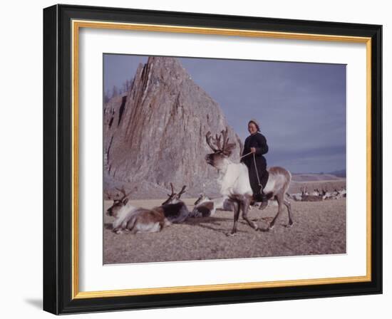 Woman Riding One of Her Reindeer in Outer Mongolia-Howard Sochurek-Framed Photographic Print