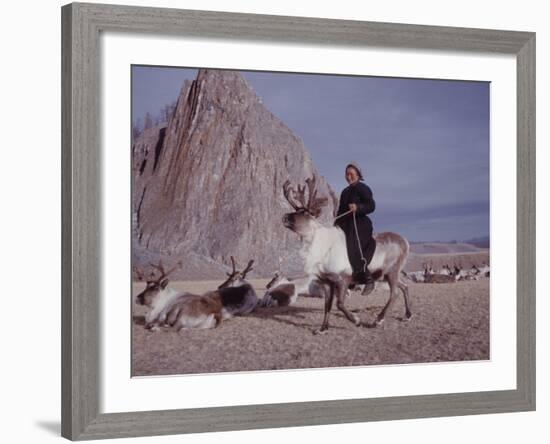 Woman Riding One of Her Reindeer in Outer Mongolia-Howard Sochurek-Framed Photographic Print