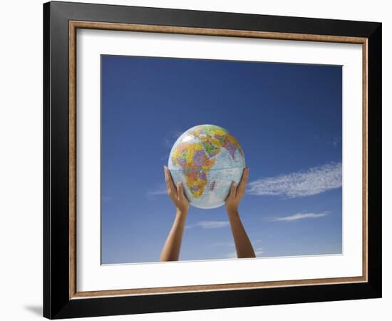 Woman's Hands Holding Globe, Death Valley National Park, California-Angelo Cavalli-Framed Photographic Print