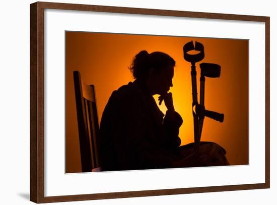 Woman Seated with Crutches-Anthony West-Framed Photographic Print