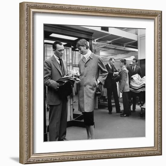 Woman Shopping in Brooks Brothers Wearing Men's Tweed Topcoat-Nina Leen-Framed Photographic Print