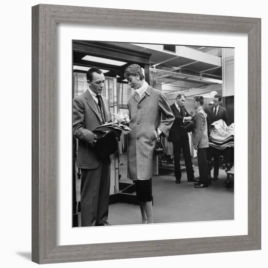 Woman Shopping in Brooks Brothers Wearing Men's Tweed Topcoat-Nina Leen-Framed Photographic Print