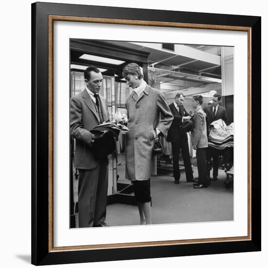 Woman Shopping in Brooks Brothers Wearing Men's Tweed Topcoat-Nina Leen-Framed Photographic Print